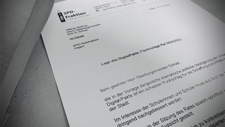 Das BIld zeigt den Offenen Brief auf einem Briefkuvert.